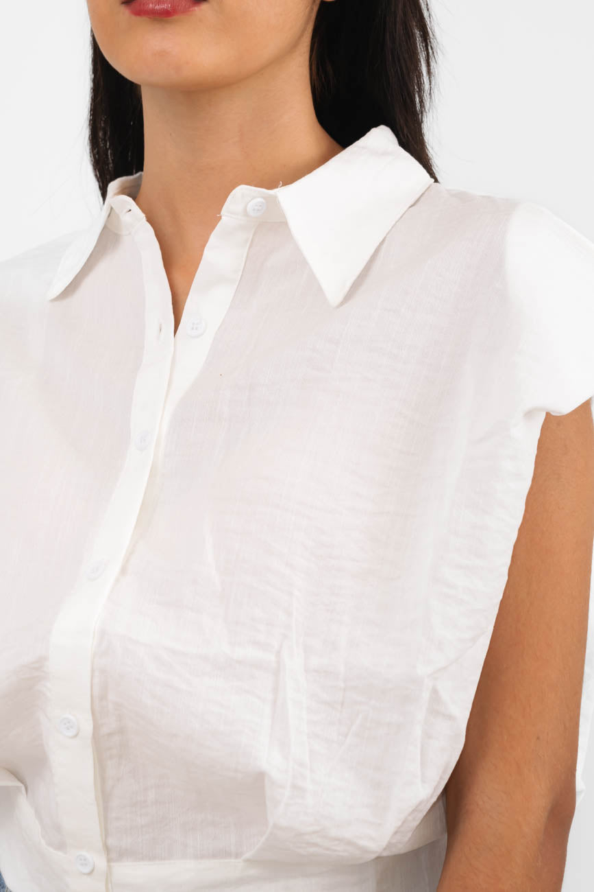 Blusa corta con hombreras