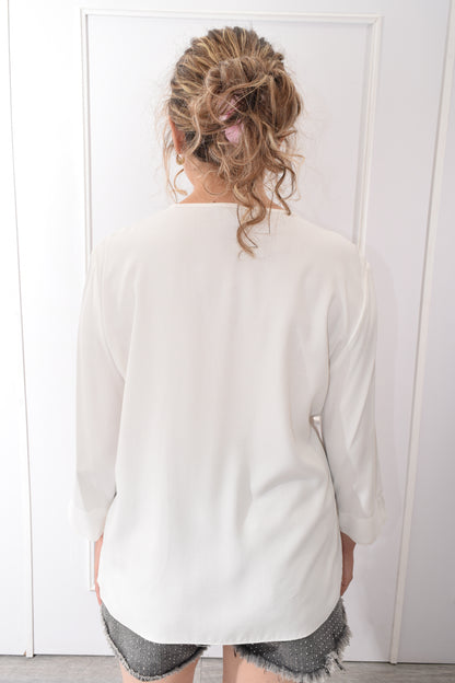 Blusa Ojillos