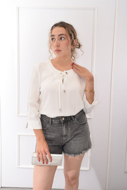 Blusa Ojillos
